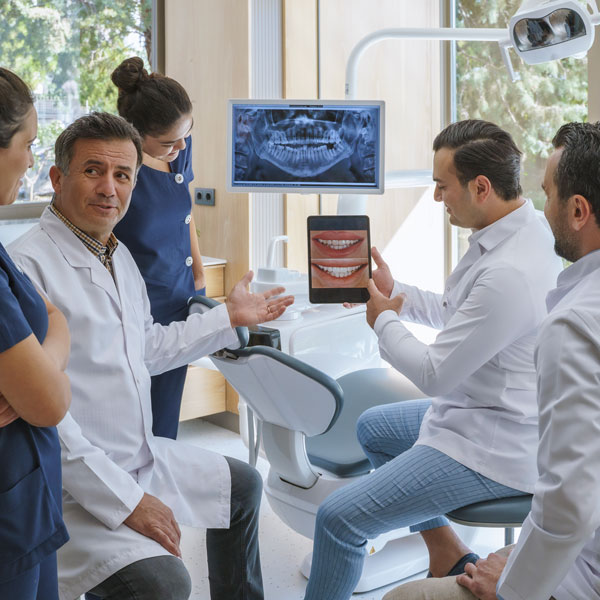 dental professionals talking